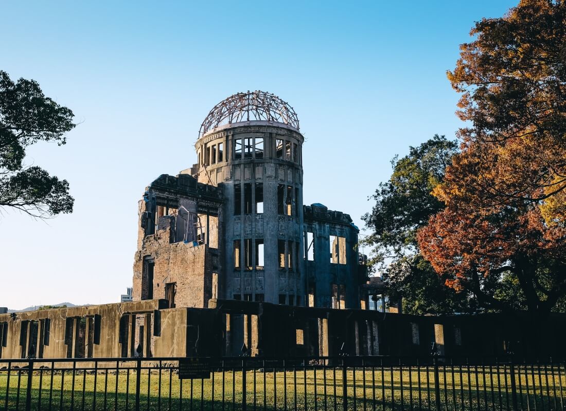 The ruins of Hiroshima stand tall in the sunlight. 