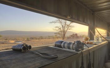 A hide with binoculars and cameras is in Saruni Samburu.