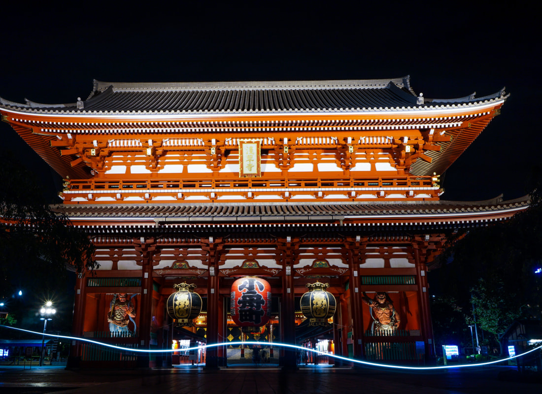 Senso-Ji Temple is illuminated with light as darkness descends. 