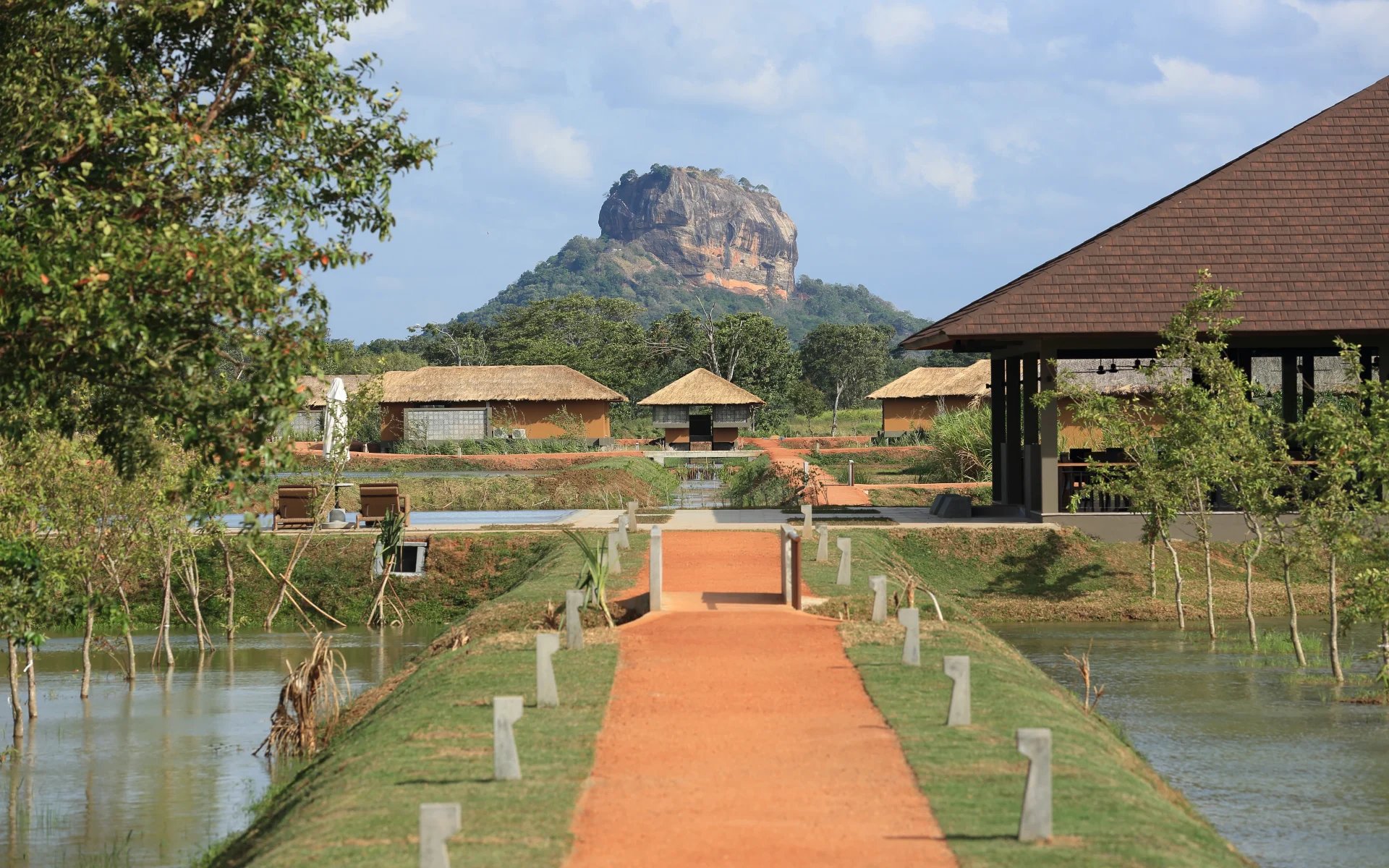 Water Garden Sigiriya is surrounded by Sigiriya Rock. 