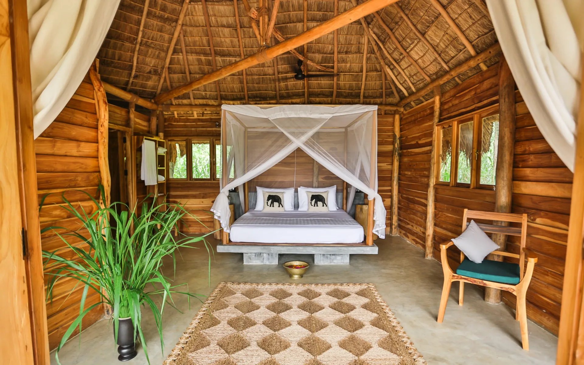 Gal Oya Lodge bedroom with canopy bed.
