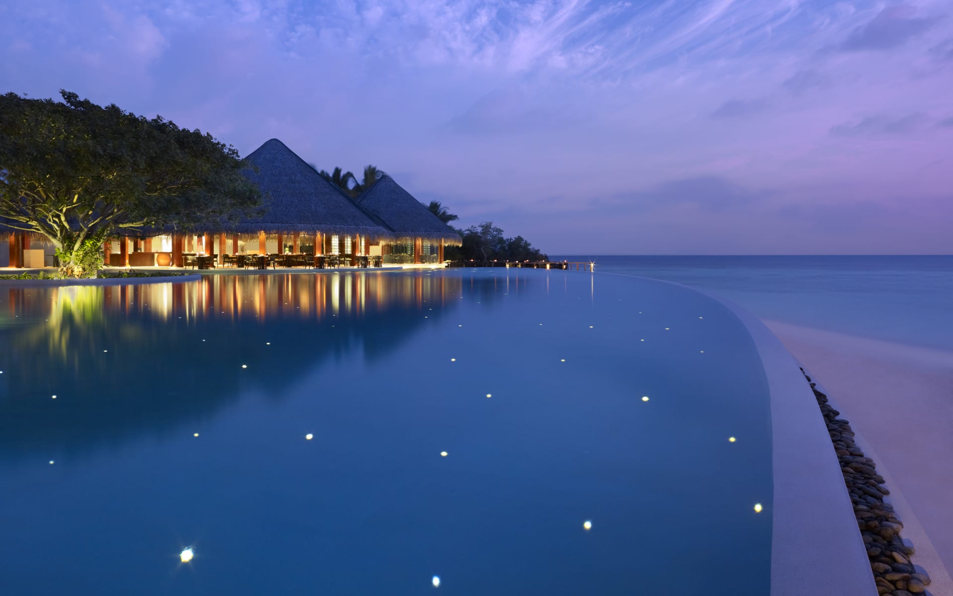 main-swimming-pool-at-twilight-dusit-thani-maldives_glqfr4