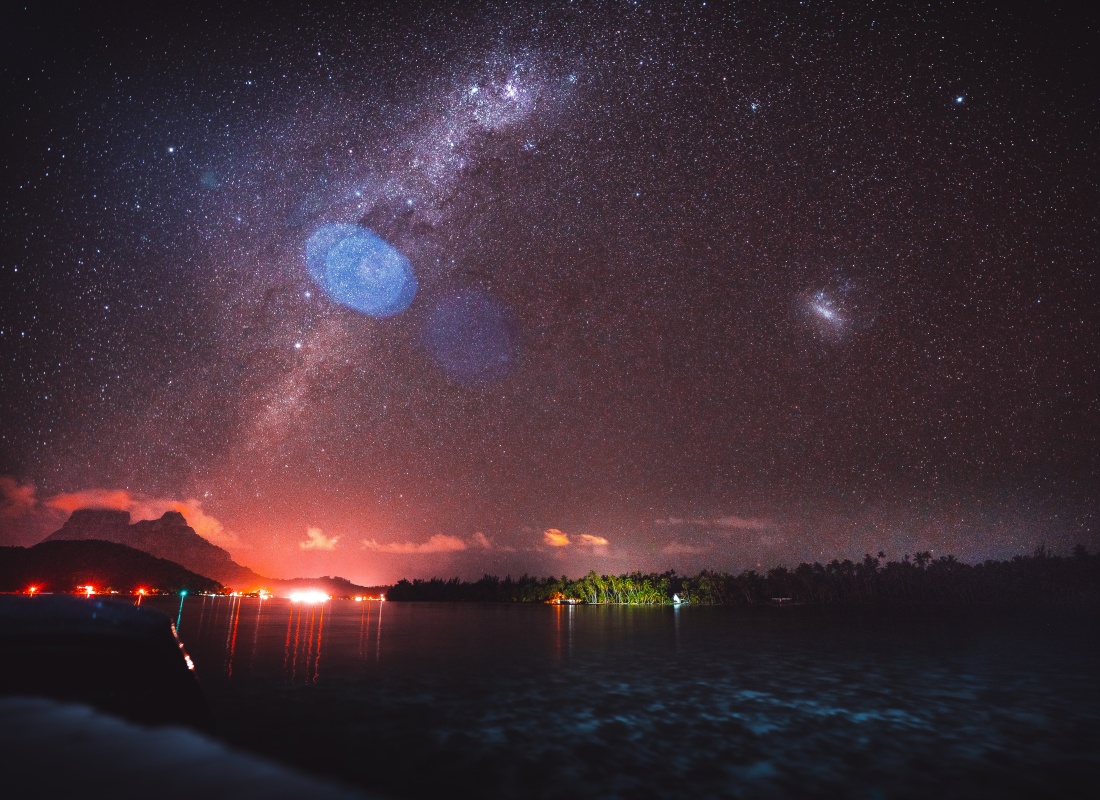 Bora Bora is dark, but you can see the Milkyway sparkling across the sky. 