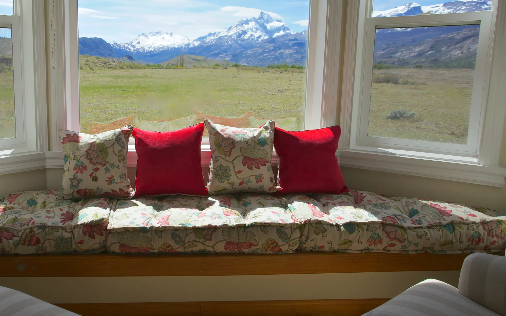 A window seat in one of the bungalows looks out to a magnificent view of the Patagonian Andes.