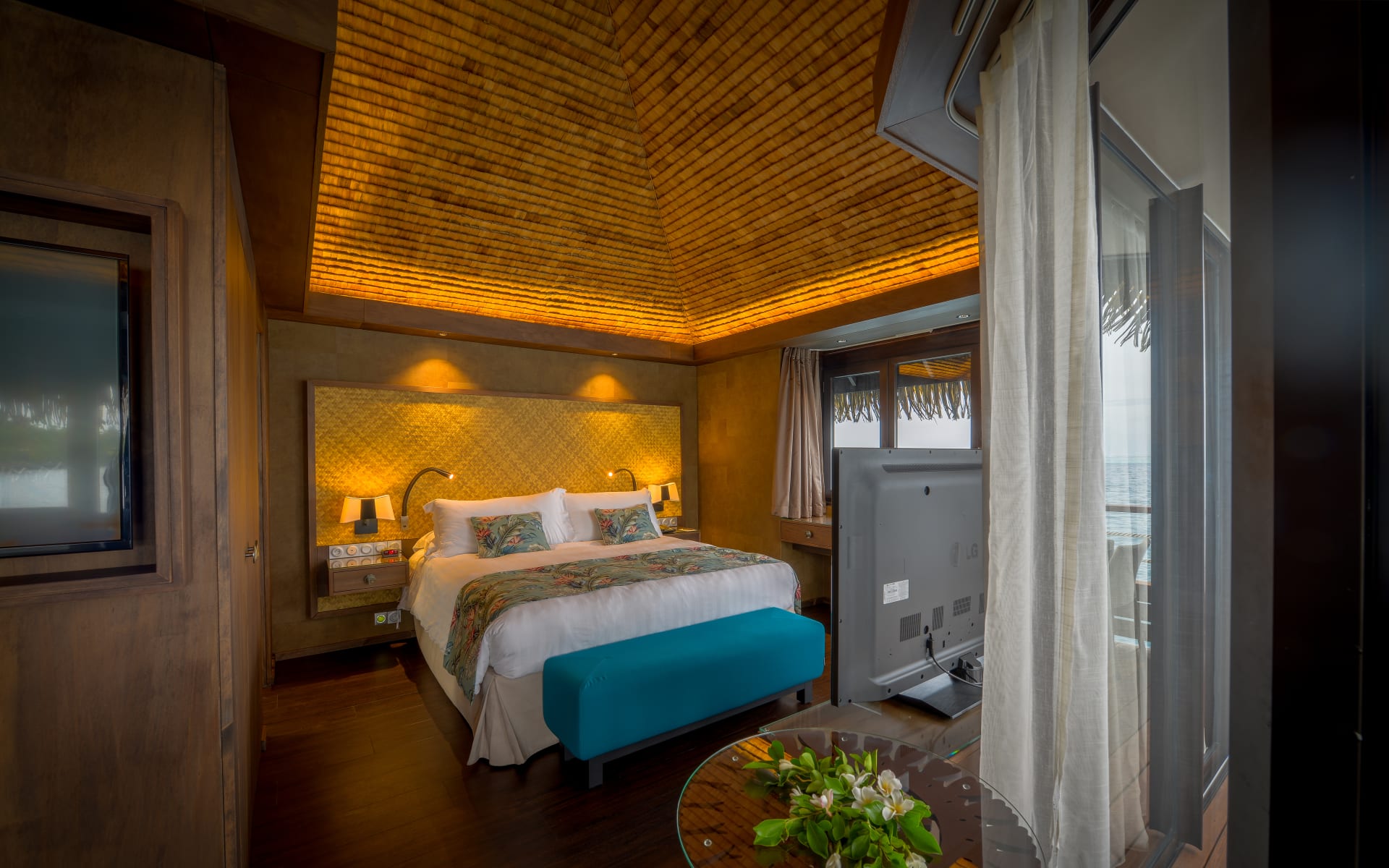 Overwater villas have a king-sized bed. 