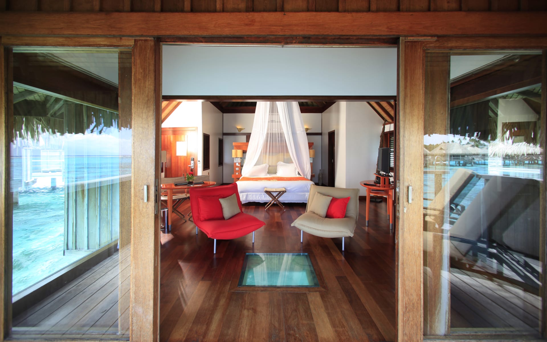 Living room in luxury overwater bungalow