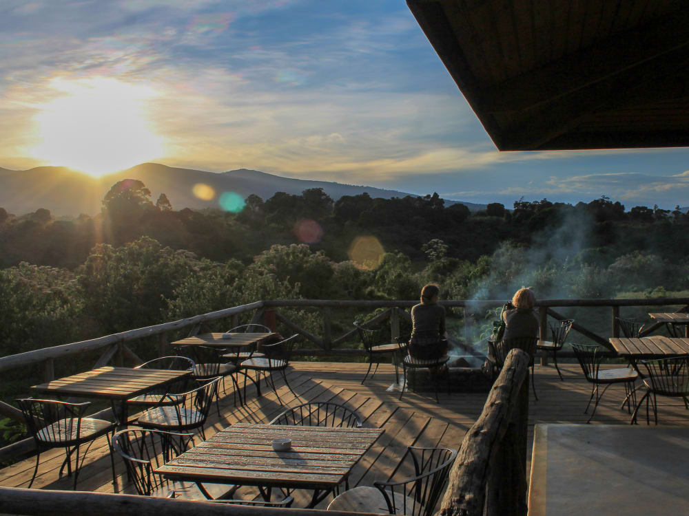 Rhino Lodge deck with wooden tables and chairs