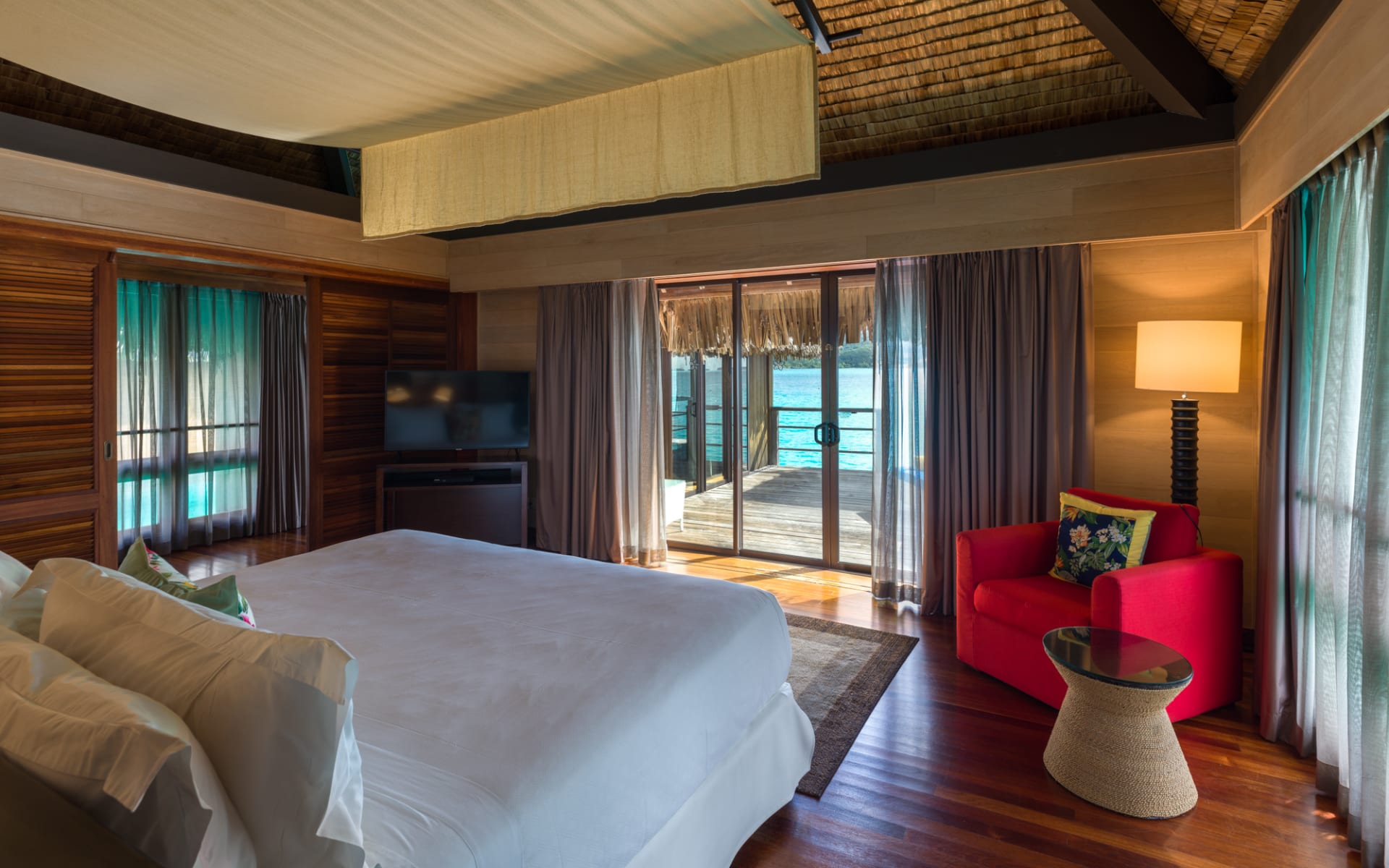 deluxe overwater bedroom with ocean views
