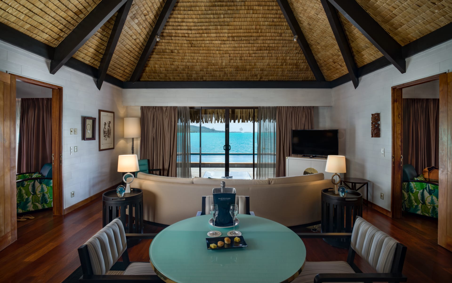 Living area of royal overwater bungalow with ocean view