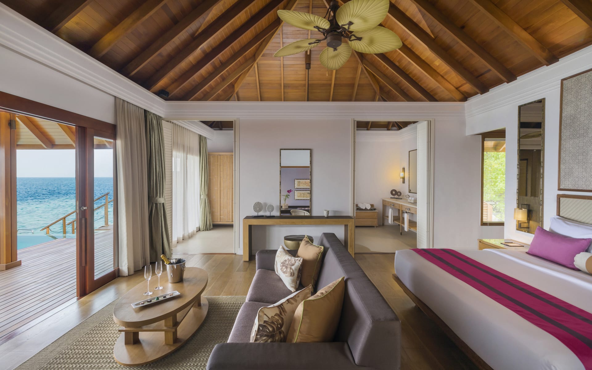 dusit-thani-maldives_water-villa-bedroom-osbnoi