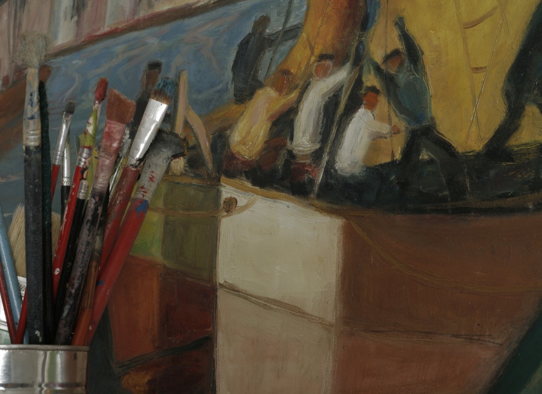 An abstract painting of men on a boat has paintbrushes in front of it. 