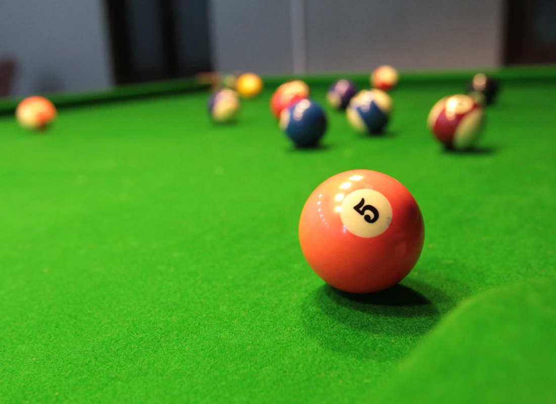 A close-up of one of the pool tables in the resort's leisure spaces.