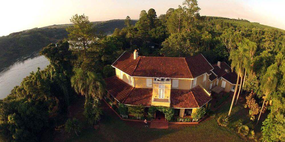 aerial view of posada puerto pemberg surrounded by jungle at iguazu falls argentina