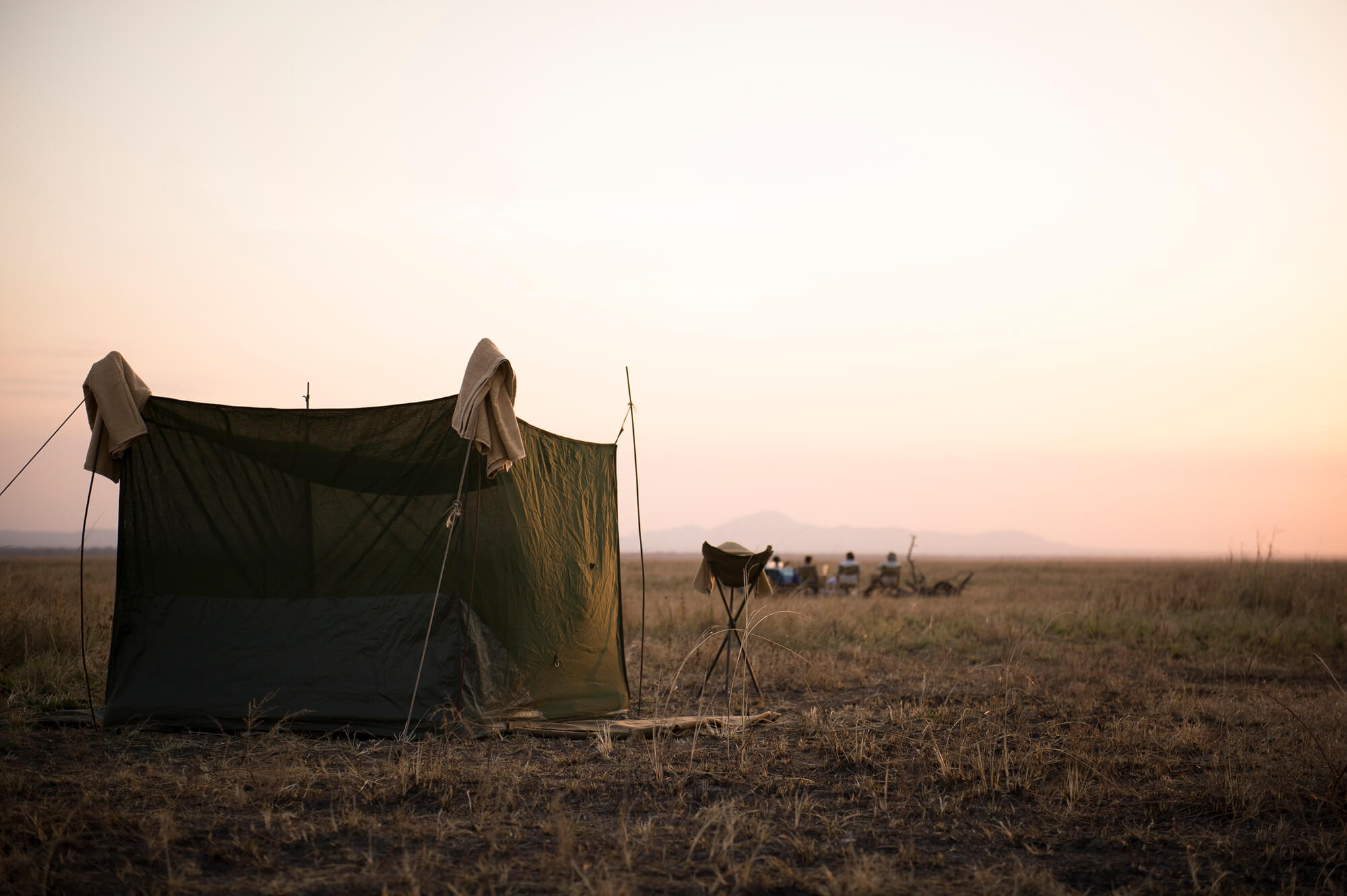 Sleeping Out under the stars, but with a private shower and loo area