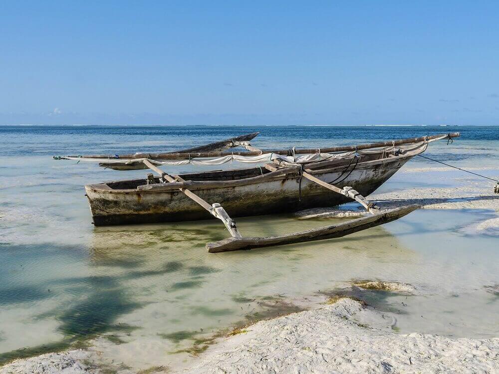 Dhow fishing boat on a beach in Zanzibar