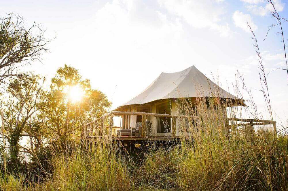 Stilted chalets at Ila Safari Lodge in Kafue Zambia