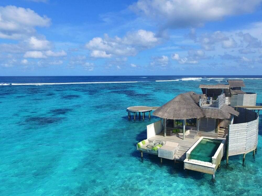 overwater villas with private pool at six senses laamu maldives