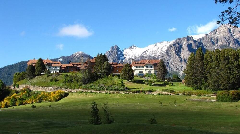 Llao Llao resort surrounded by trees and mountains in Bariloche Argentina