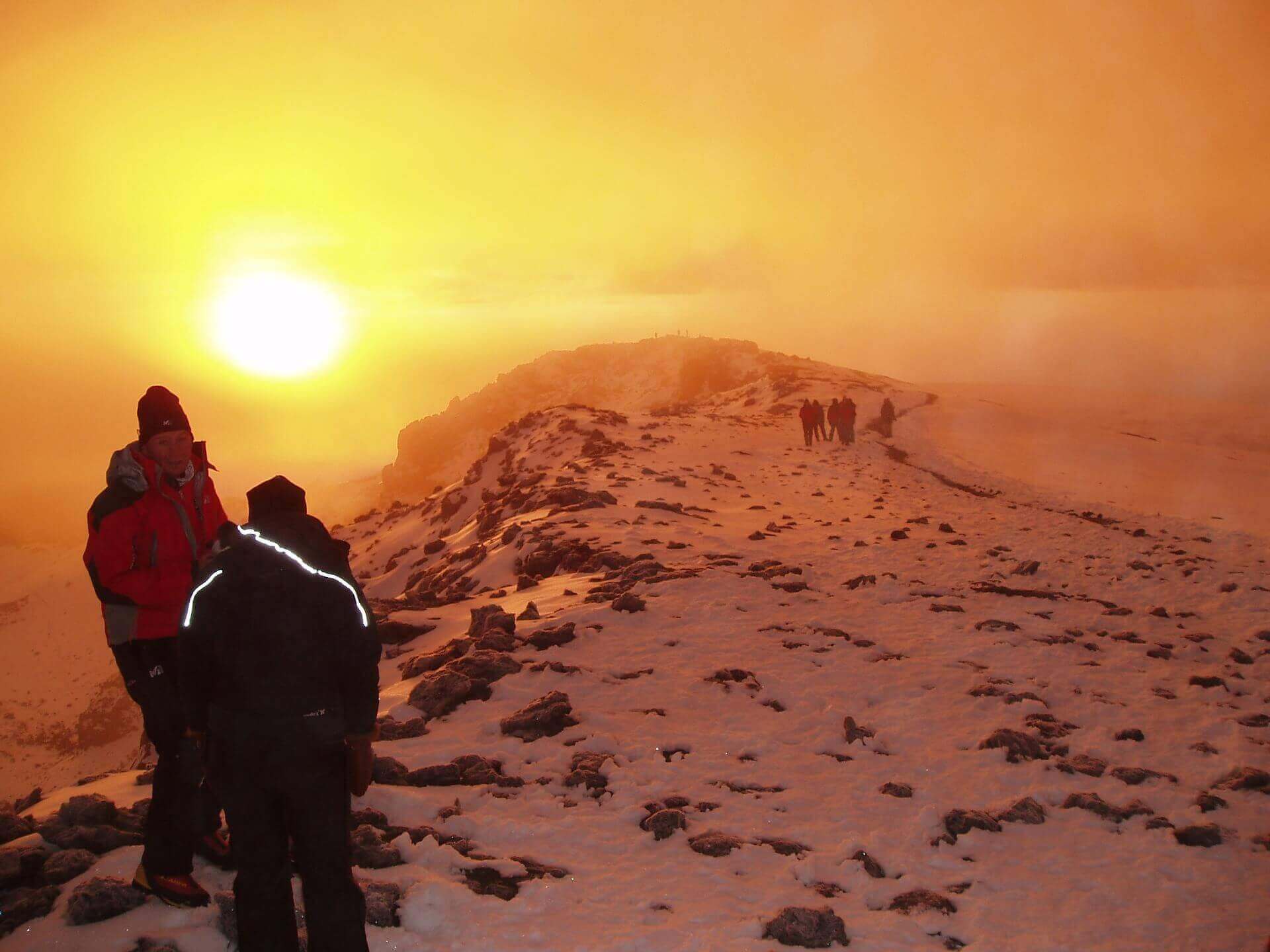 Mount Kilimanjaro trekking to the summit at sunrise