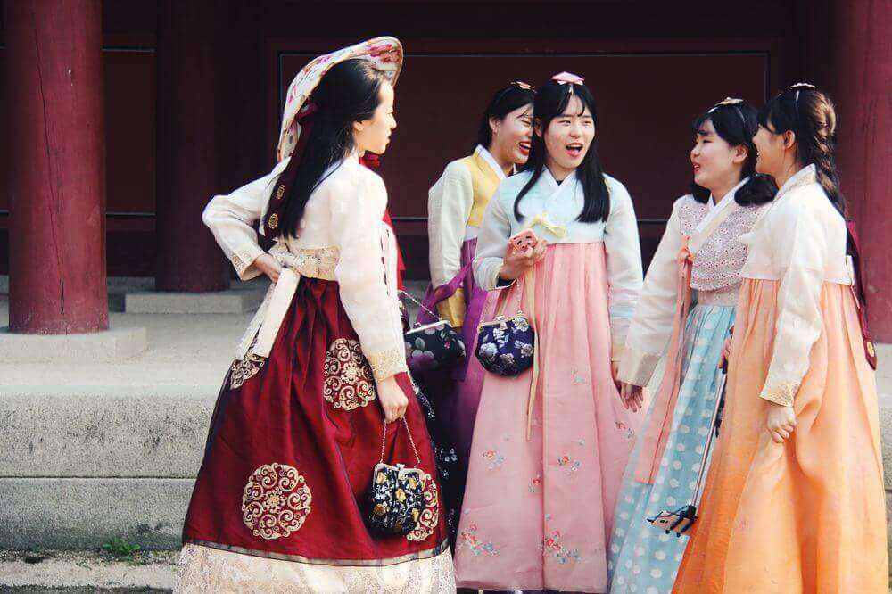 korean women dressed in traditional hanbok for solleal korean new year