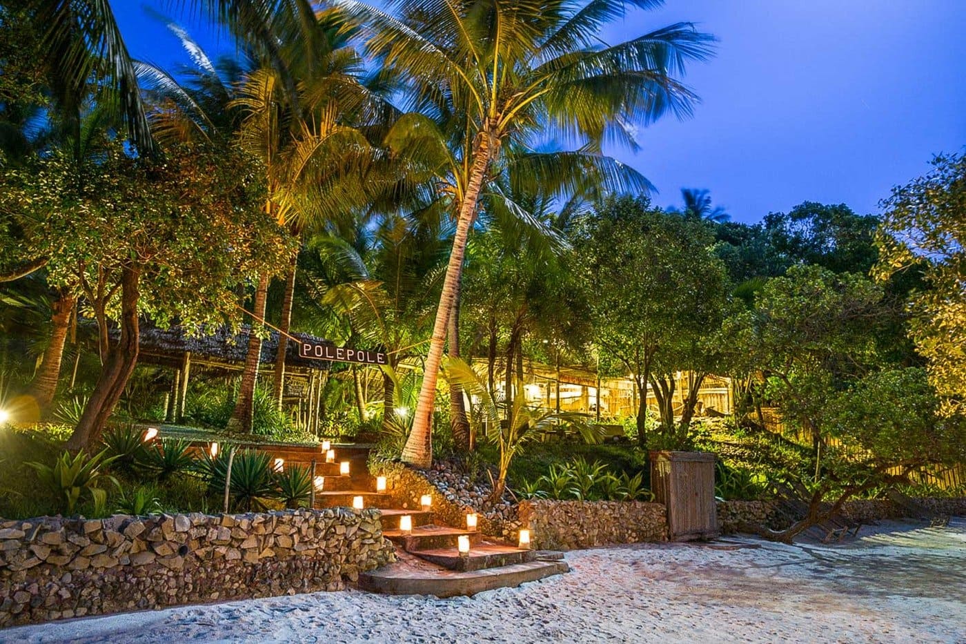 Stepping down onto the private beach at Pole Pole Lodge on Mafia Island