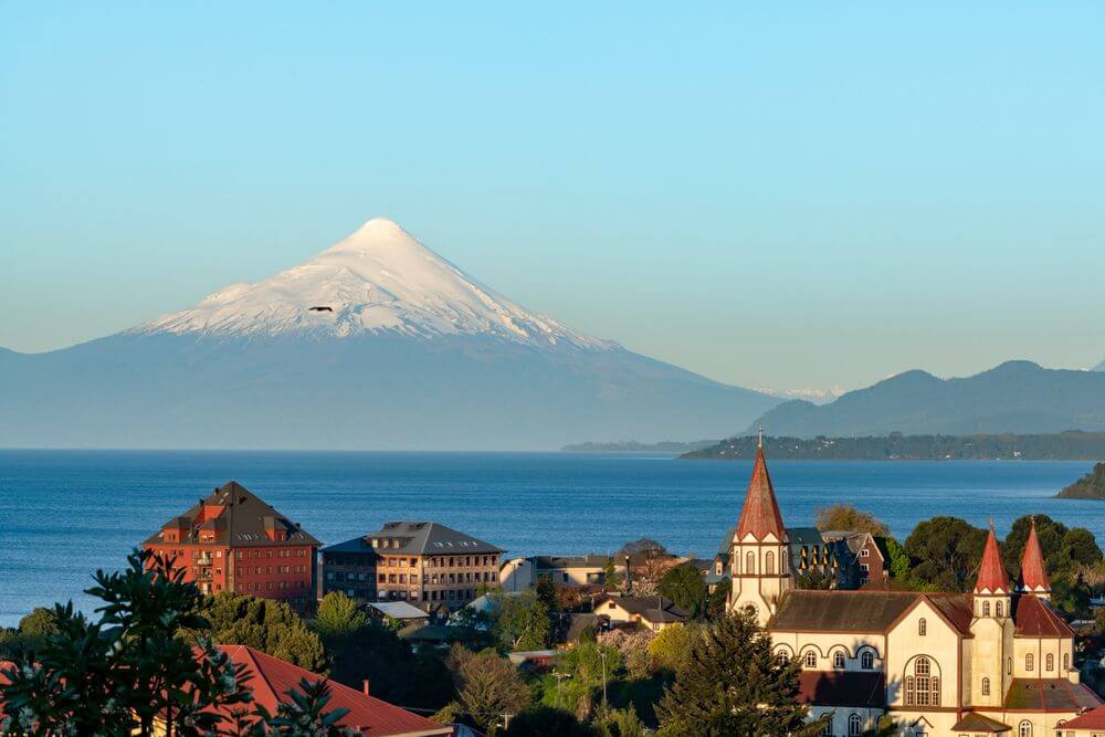 snow-capped volcanoes in the background of Puerto Varas, Chile