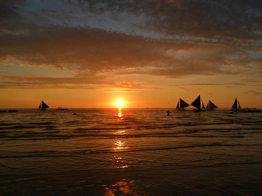 Sunset on White Beach on Boracay Island in the Philippines