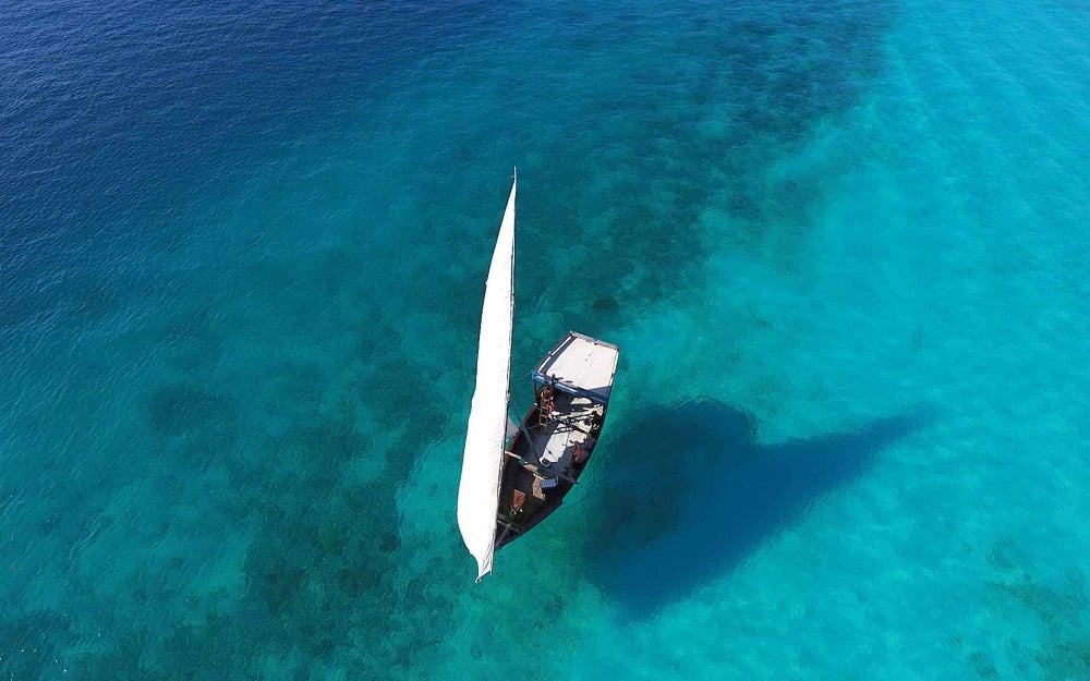 White sailboat in Zanzibar on an East Africa honeymoon