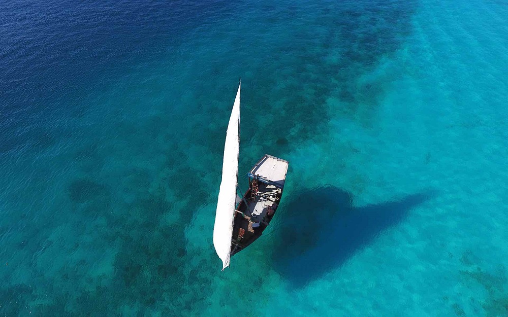 White sailboat in Zanzibar on an East Africa honeymoon