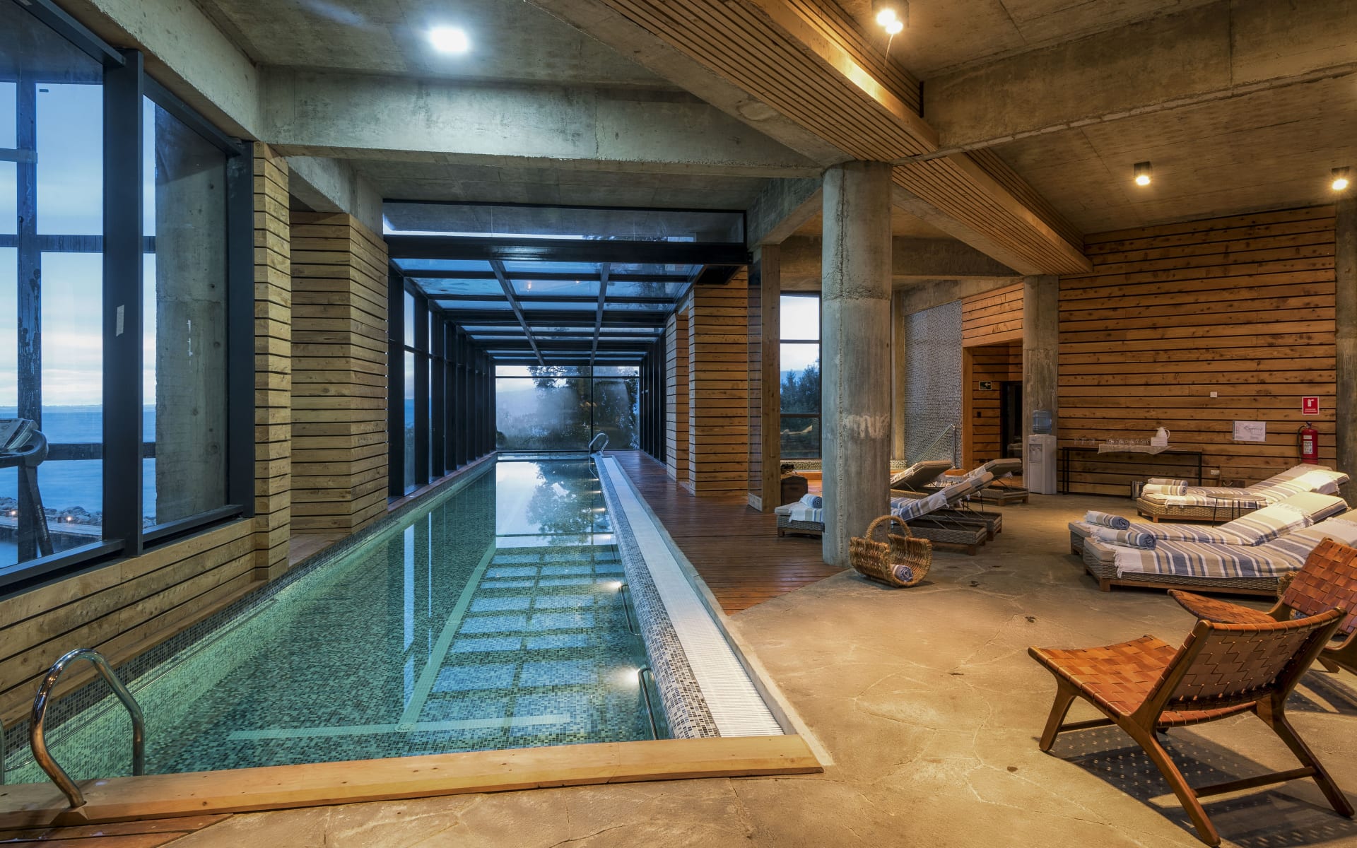 Indoor sun loungers and a swimming pool comprise the spa at Hotel AWA.